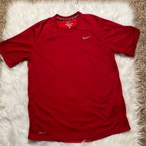 Nike Dri-Fit Men’s work out shirt, back has a mesh, stripped material. Size L